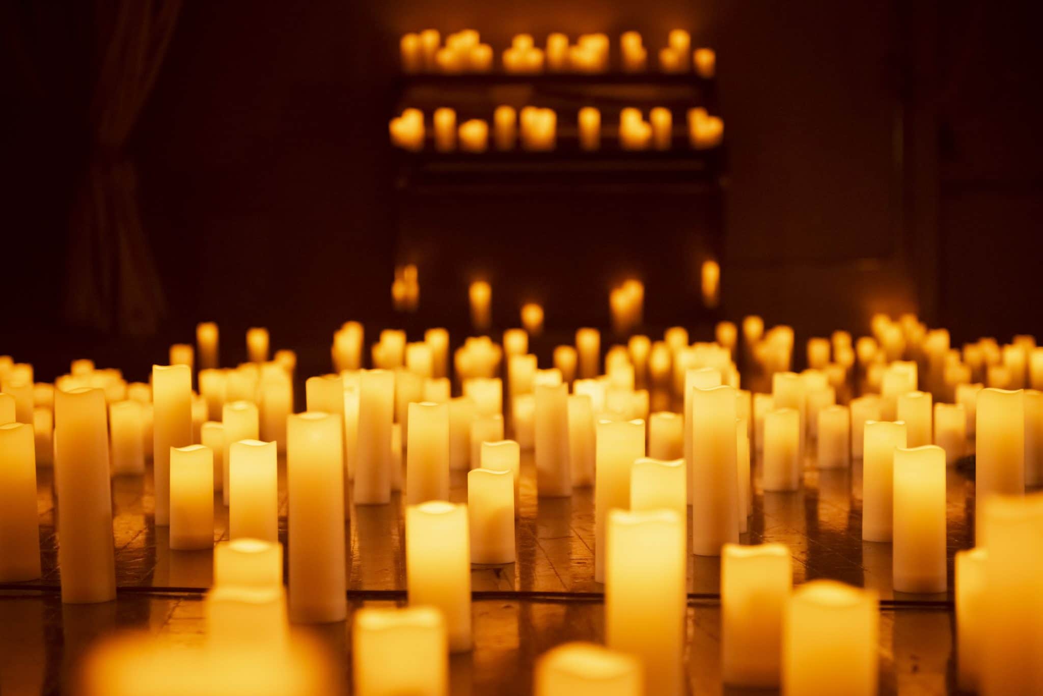 An image taken at Candlelight concerts showing a hundreds of candles. 