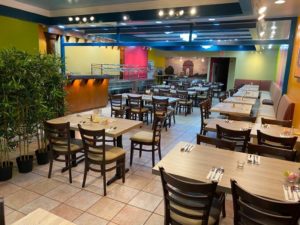 Interiors, seating and buffet at Mayura Indian Restaurant in Philly